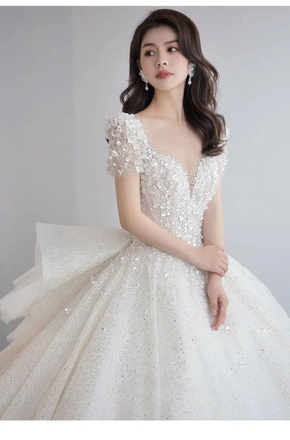 Luxury Short Sleeve Wedding Dress 2026 New Bridal Dress V Neck Beading Shinning Ball Gown Sweep Train Vestido  Noiva Customized