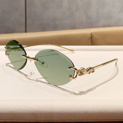 2026 New Fashion Leopard Head Frameless Oval Sunglasses Women Men Internet Celebrity Female Sunscreen Sun Glasses High-end UV400