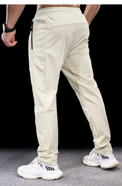 New Autumn Winter Men Quick-drying Sports Casual Trousers Gym Fitness Running Training Clothes Micro-elastic Zipper Pocket Pants
