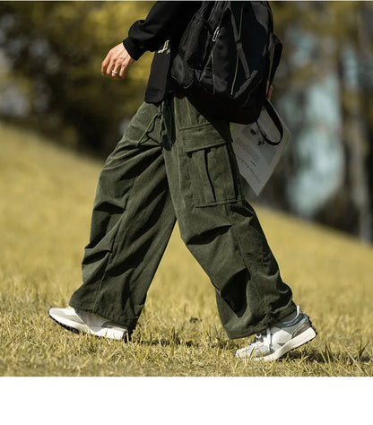 2025 autumn and winter new retro brown corduroy multi pocket workwear pants for men, loose drawstring elastic waist pants