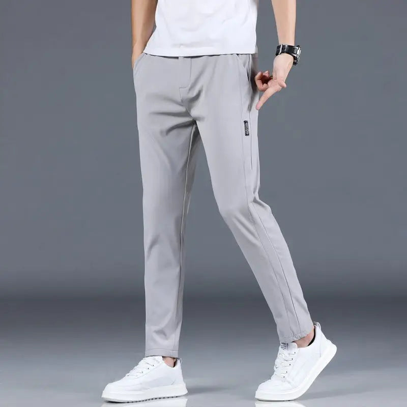 Ice silk men's pants 2026 summer new black gray thin business casual pants outdoor elastic breathable straight leg sports pants