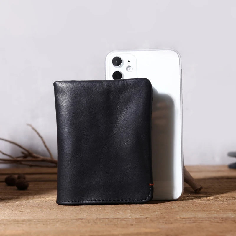 Portefeuille en cuir de vachette couche supérieure Portefeuille en cuir véritable souple Porte-cartes de crédit pour hommes Sac à main de luxe Noir Élégant Simple Portefeuilles pour hommes
