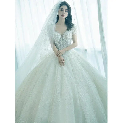 Luxury Short Sleeve Wedding Dress 2026 New Bridal Dress V Neck Beading Shinning Ball Gown Sweep Train Vestido  Noiva Customized