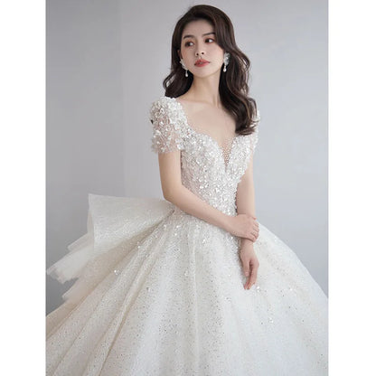Luxury Short Sleeve Wedding Dress 2026 New Bridal Dress V Neck Beading Shinning Ball Gown Sweep Train Vestido  Noiva Customized