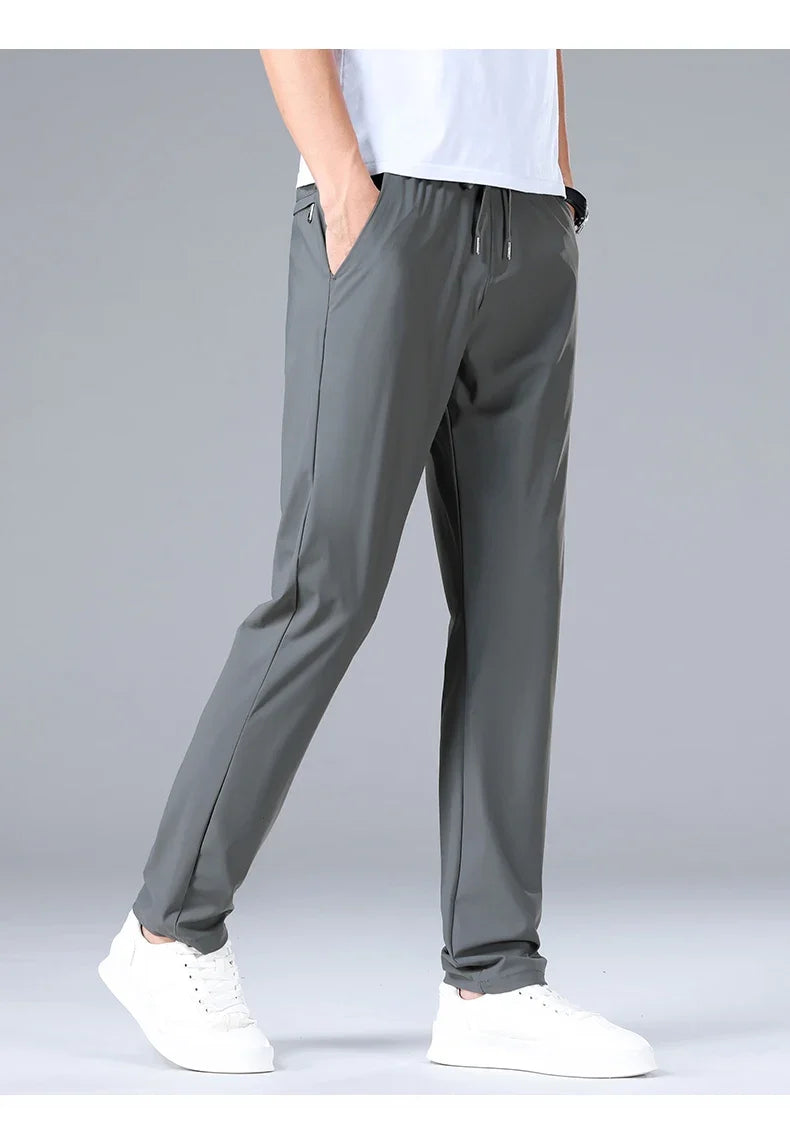 High Quality Ice Silk Stretch New Brand Casual Fashion Elastic Strappy Long Pants Street Style Pencil Teens Trousers Men Clothes