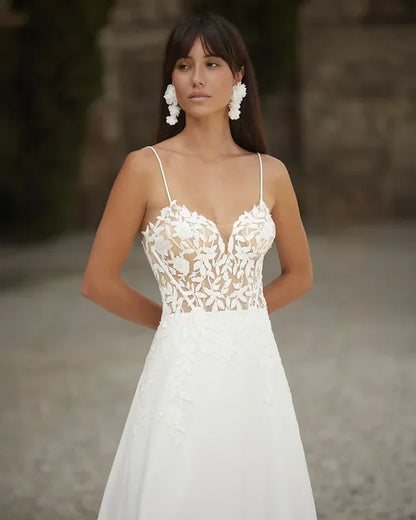2026 Customized A line Bridal Gown Lace Applique Spaghetti Straps Backless Wedding Dress for Elegant Brides