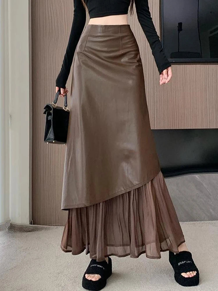 تنورة نسائية ريترو، تنورة طويلة بخصر عالٍ وقصة A-line بتصميم جديد للخريف المبكر من الجلد بخياطة غير متماثلة