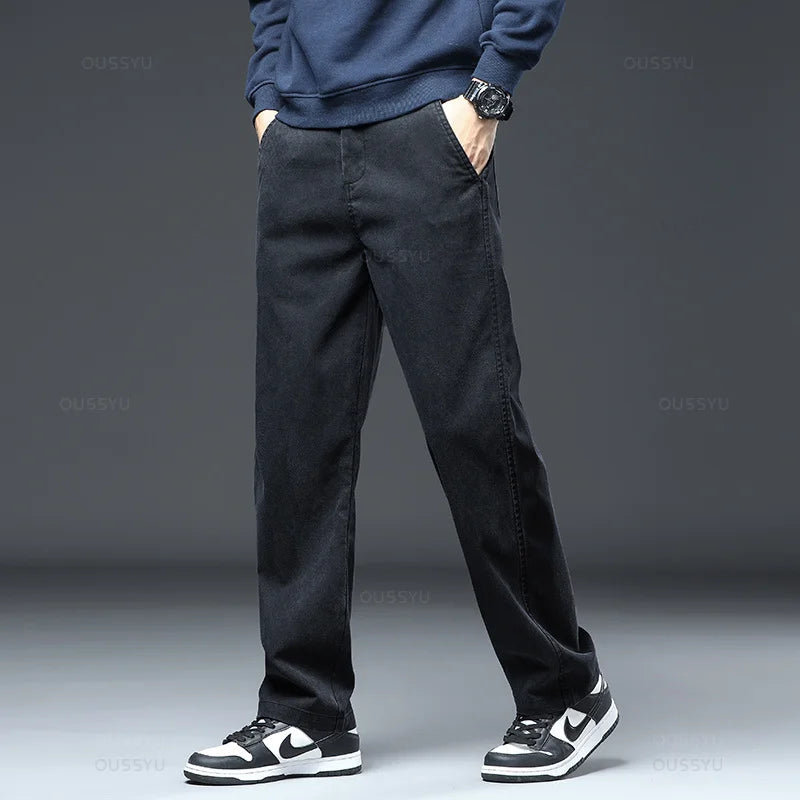 2025 New High Quality Soft Lyocell Fabric Jeans Men Elastic Waist Loose Straight Four Seasons Denim Trousers Male Plus Size 5XL