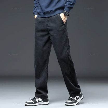 2025 New High Quality Soft Lyocell Fabric Jeans Men Elastic Waist Loose Straight Four Seasons Denim Trousers Male Plus Size 5XL