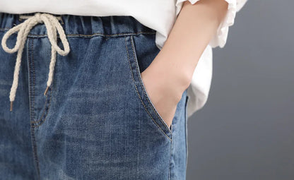 2025 Chinese Summer Fashion Ladies Vintage Embroidery Jeans Women Casual Floral Denim Trousers Ripped Harem Pantalons