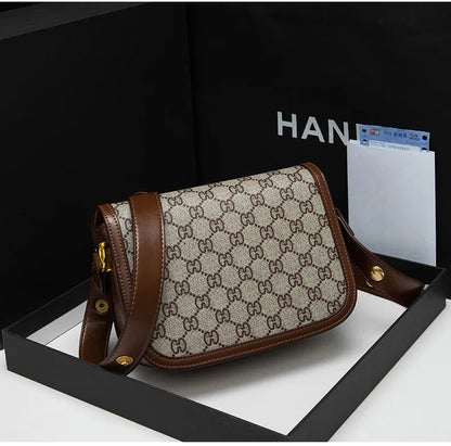 Ladies genuine leather saddle bag, single shoulder bag underarm bag, new fashion versatile niche trend crossbody bag.