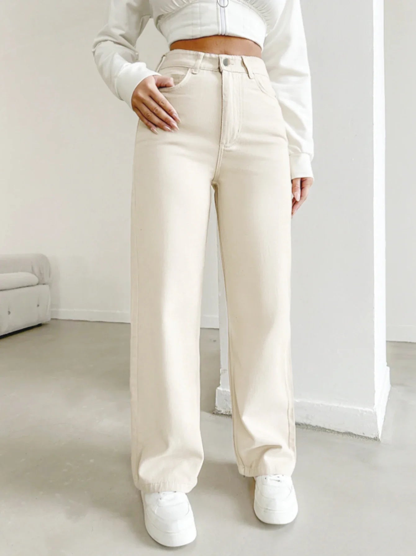 Women's autumn jeans, made of cotton denim, in a beige apricot color, straight-leg, slim fit, high-waisted, elastic waistband