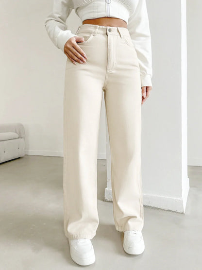 Women's autumn jeans, made of cotton denim, in a beige apricot color, straight-leg, slim fit, high-waisted, elastic waistband