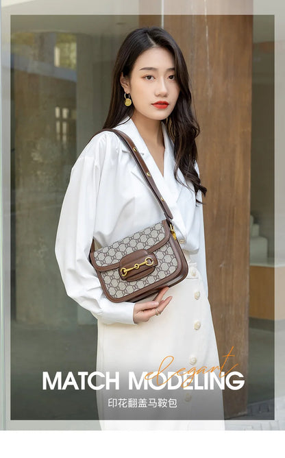 Ladies genuine leather saddle bag, single shoulder bag underarm bag, new fashion versatile niche trend crossbody bag.