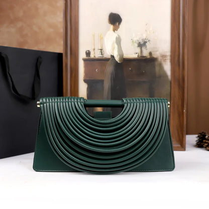 The 2025 new hand-held woven bag with lines is a unique, high-end, individual and fashionable handbag for women