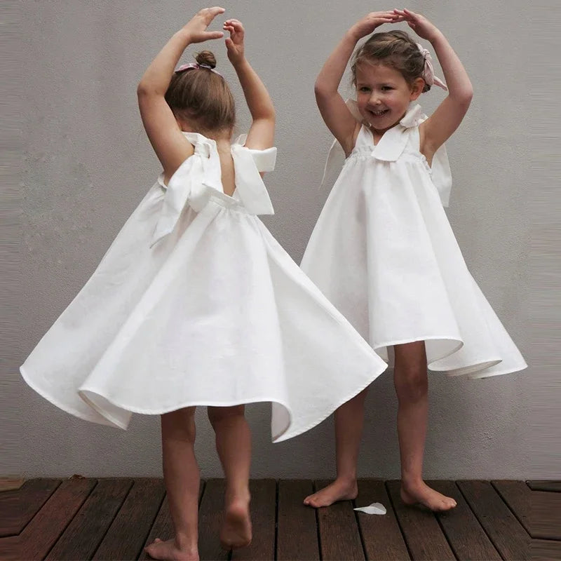 Summer Girl's Bow Tie Shoulder Straps 100% Cotton White Dress 2026 New Flower Girl Loose Vacation Party Princess Dresses