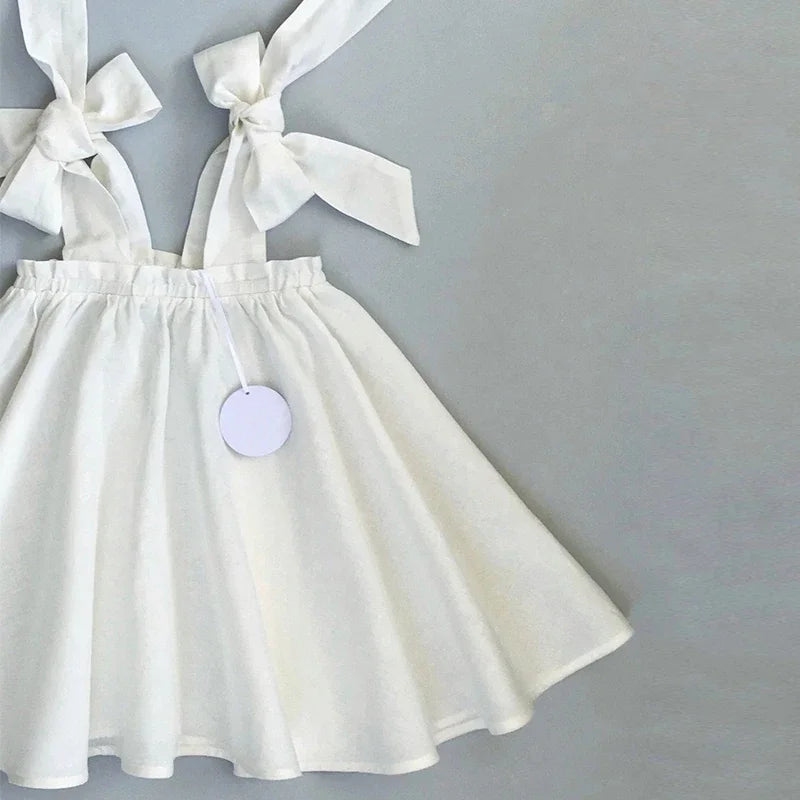 Summer Girl's Bow Tie Shoulder Straps 100% Cotton White Dress 2026 New Flower Girl Loose Vacation Party Princess Dresses