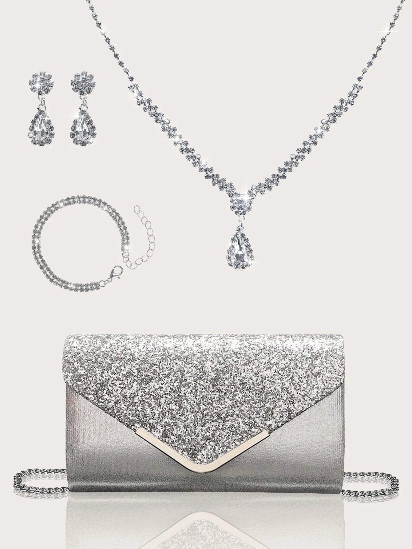 Gorgeous and elegant sparkly women's clutch bag, paired with a gorgeous rhinestone necklace, earrings and bracelet set of four.