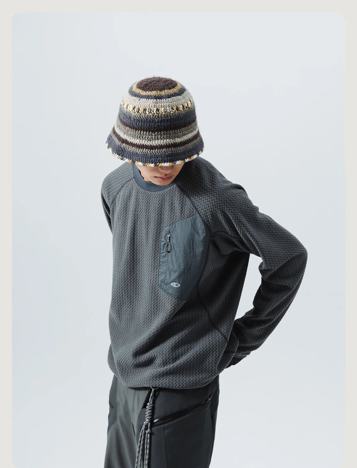 Mountain-Ready Crewneck: Engineered with Ribbed Neck, Reflective Logo, & Secure Chest Pocket for Outdoor Style Unisex