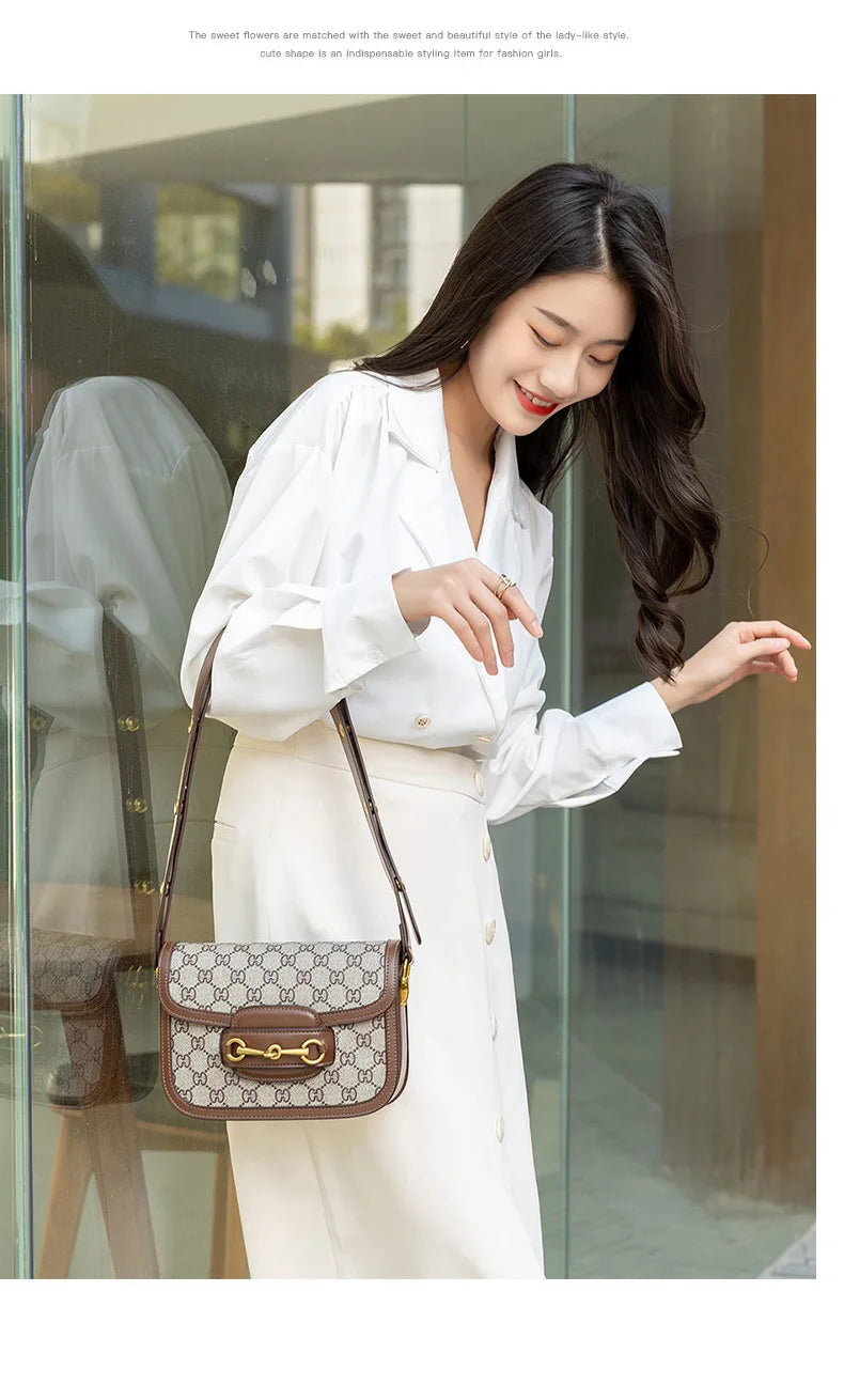 Ladies genuine leather saddle bag, single shoulder bag underarm bag, new fashion versatile niche trend crossbody bag.