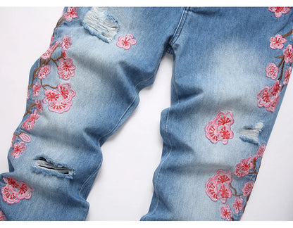 Men Sakura Embroidery Denim Jeans Streetwear Boot Cut Pants Released Hem Flared Trousers with Ripped And Cherry Blossom Design
