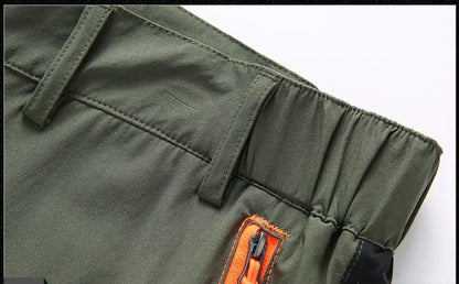 New Summer Men Thin Multi Pocket Work Pants Outdoor Casual Sports Breathable Cargo Pants Straight Leg Loose Tooling Trousers 4XL