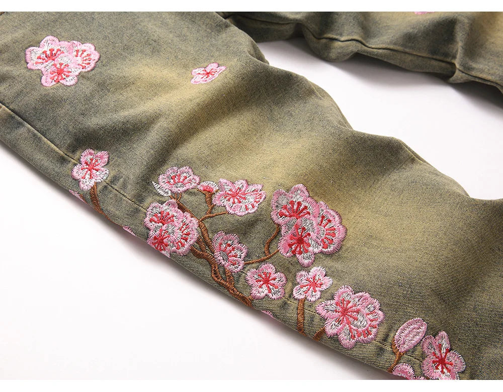 Men Sakura Embroidery Denim Jeans Streetwear Boot Cut Pants Released Hem Flared Trousers with Ripped And Cherry Blossom Design