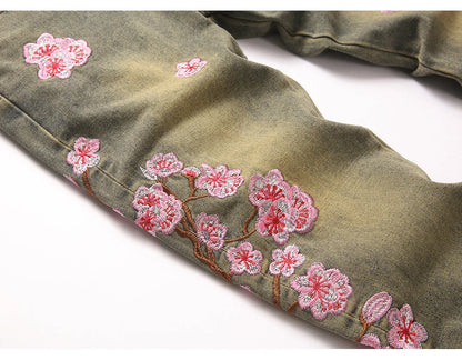 Men Sakura Embroidery Denim Jeans Streetwear Boot Cut Pants Released Hem Flared Trousers with Ripped And Cherry Blossom Design