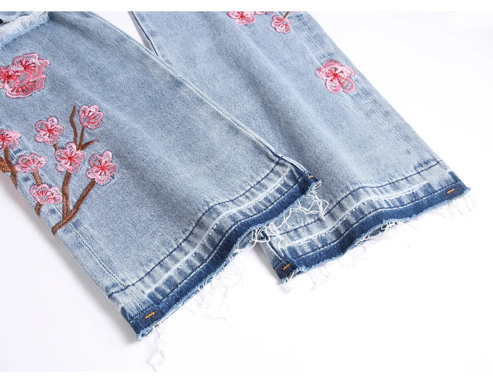 Men Sakura Embroidery Denim Jeans Streetwear Boot Cut Pants Released Hem Flared Trousers with Ripped And Cherry Blossom Design