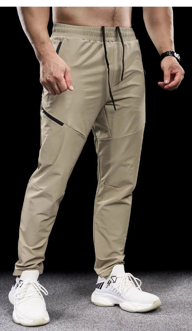 New Autumn Winter Men Quick-drying Sports Casual Trousers Gym Fitness Running Training Clothes Micro-elastic Zipper Pocket Pants