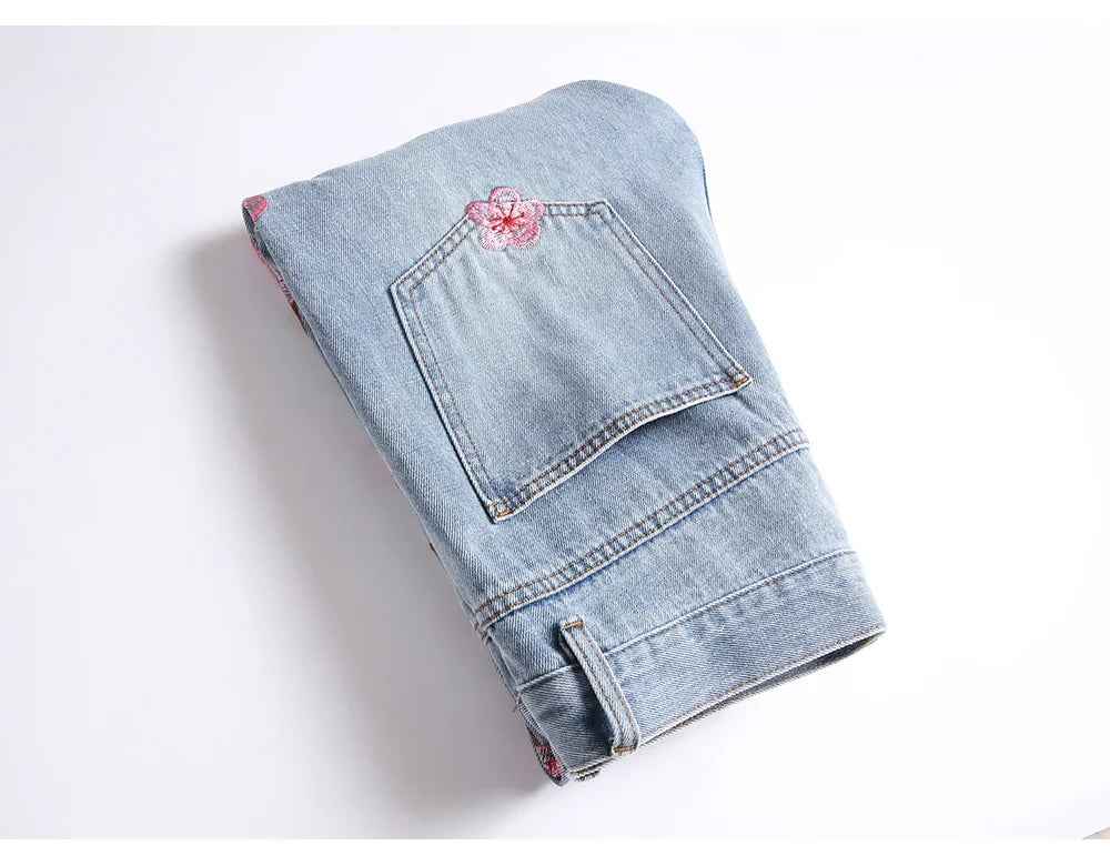 Men Sakura Embroidery Denim Jeans Streetwear Boot Cut Pants Released Hem Flared Trousers with Ripped And Cherry Blossom Design