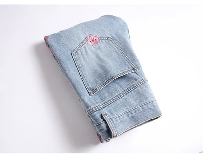 Men Sakura Embroidery Denim Jeans Streetwear Boot Cut Pants Released Hem Flared Trousers with Ripped And Cherry Blossom Design