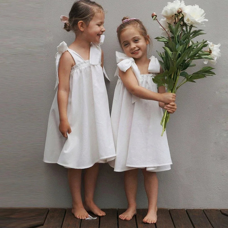 Summer Girl's Bow Tie Shoulder Straps 100% Cotton White Dress 2026 New Flower Girl Loose Vacation Party Princess Dresses