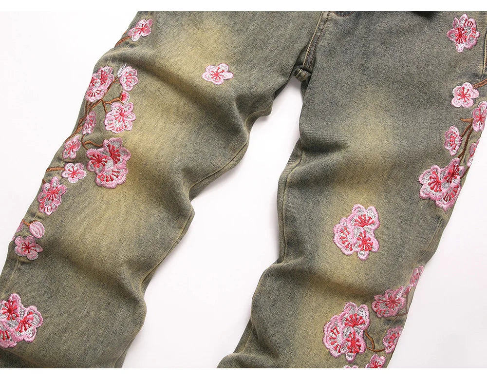 Men Sakura Embroidery Denim Jeans Streetwear Boot Cut Pants Released Hem Flared Trousers with Ripped And Cherry Blossom Design