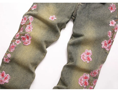 Men Sakura Embroidery Denim Jeans Streetwear Boot Cut Pants Released Hem Flared Trousers with Ripped And Cherry Blossom Design