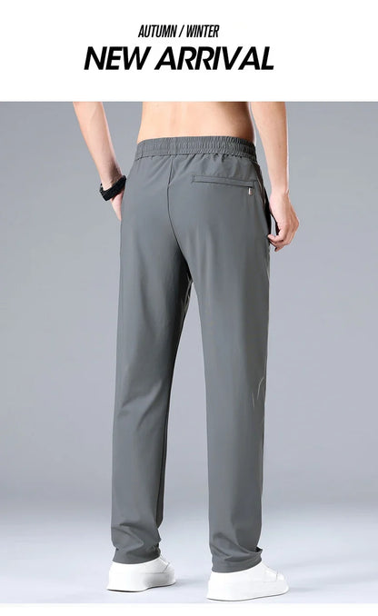 High Quality Ice Silk Stretch New Brand Casual Fashion Elastic Strappy Long Pants Street Style Pencil Teens Trousers Men Clothes