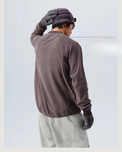 Mountain-Ready Crewneck: Engineered with Ribbed Neck, Reflective Logo, & Secure Chest Pocket for Outdoor Style Unisex