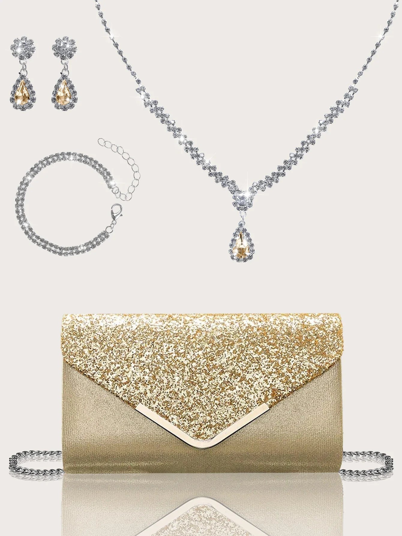 Gorgeous and elegant sparkly women's clutch bag, paired with a gorgeous rhinestone necklace, earrings and bracelet set of four.