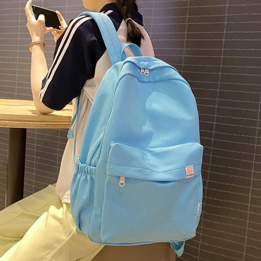 Sweet soft girl solid color large capacity student backpack new style for men and women college students simple trendy