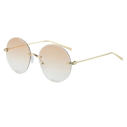 2026 New Fashion rimless circle frame sunglasses for women new alloy oversize gradient knot sun glasses ladies sexy shades uv400