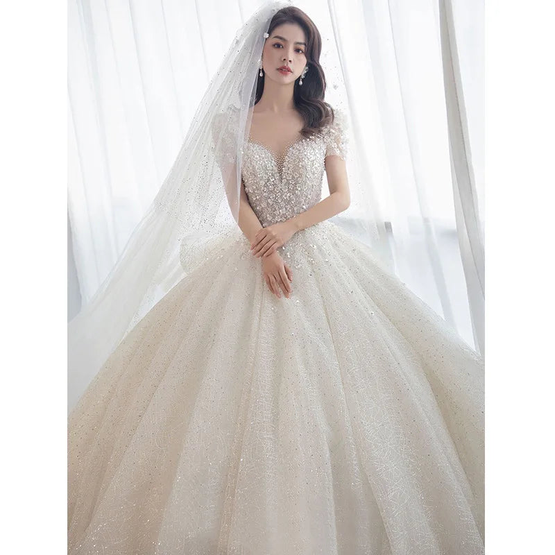 Luxury Short Sleeve Wedding Dress 2026 New Bridal Dress V Neck Beading Shinning Ball Gown Sweep Train Vestido  Noiva Customized