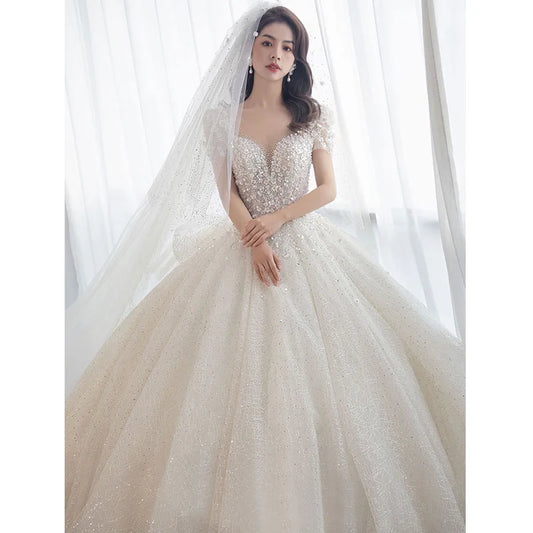 Luxury Short Sleeve Wedding Dress 2026 New Bridal Dress V Neck Beading Shinning Ball Gown Sweep Train Vestido  Noiva Customized