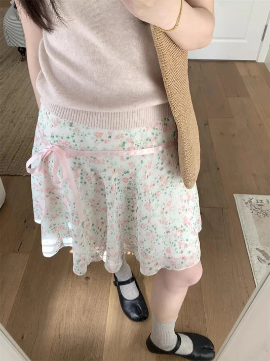 تنانير Deeptown Sweet Vintage Floral للنساء الأنيقة بفيونكة وكشكشة تنانير قصيرة على الطراز الكوري بتصميم Fairycore أنيقة بخصر عالٍ تنانير قصيرة