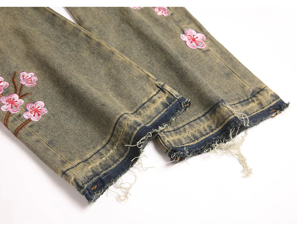 Men Sakura Embroidery Denim Jeans Streetwear Boot Cut Pants Released Hem Flared Trousers with Ripped And Cherry Blossom Design