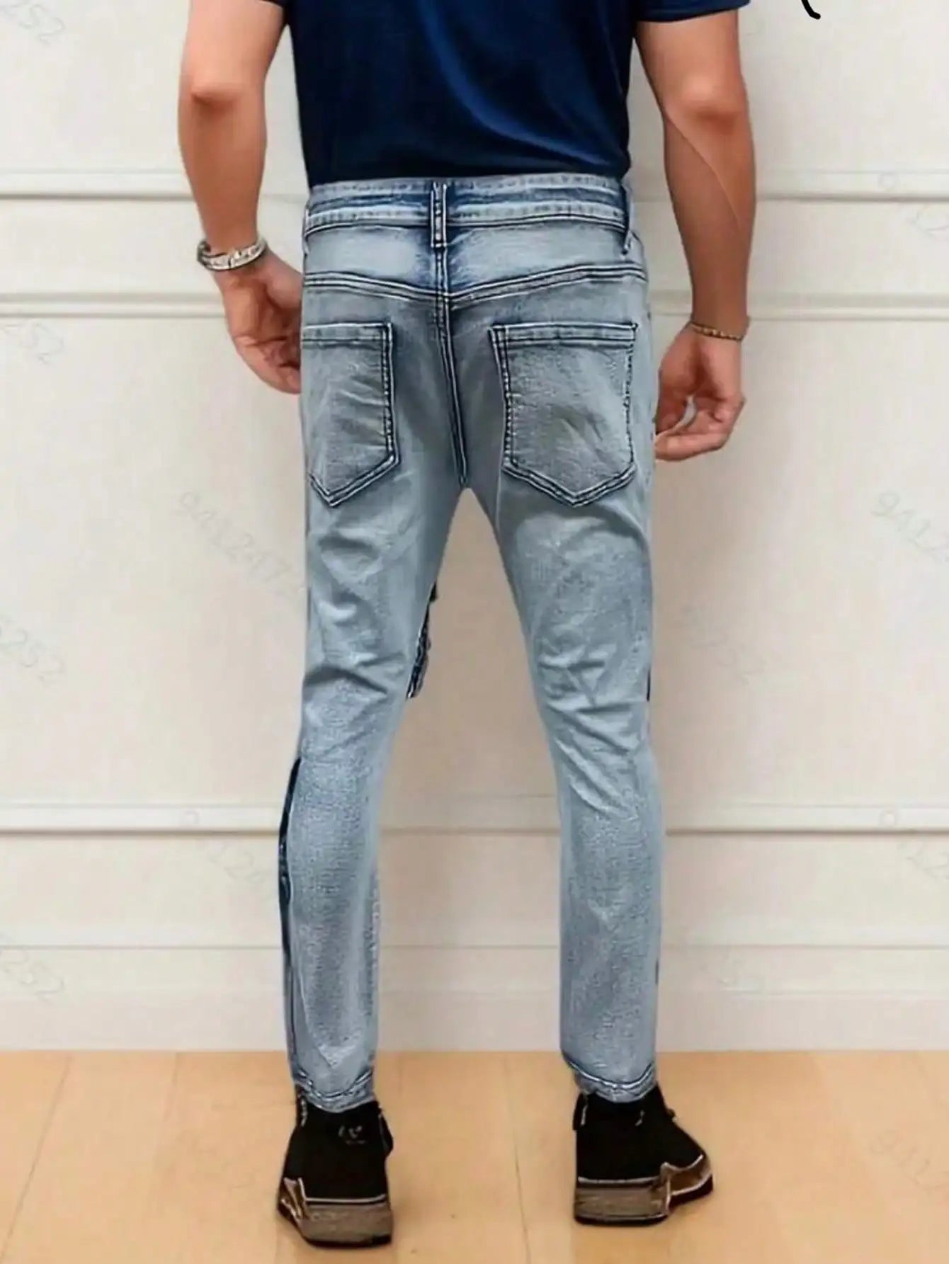 Men’s streetwear, multi pocket vehicle, snug, stretchy, light-colored jeans.