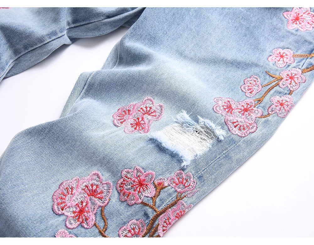 Men Sakura Embroidery Denim Jeans Streetwear Boot Cut Pants Released Hem Flared Trousers with Ripped And Cherry Blossom Design