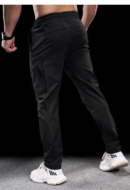 New Autumn Winter Men Quick-drying Sports Casual Trousers Gym Fitness Running Training Clothes Micro-elastic Zipper Pocket Pants
