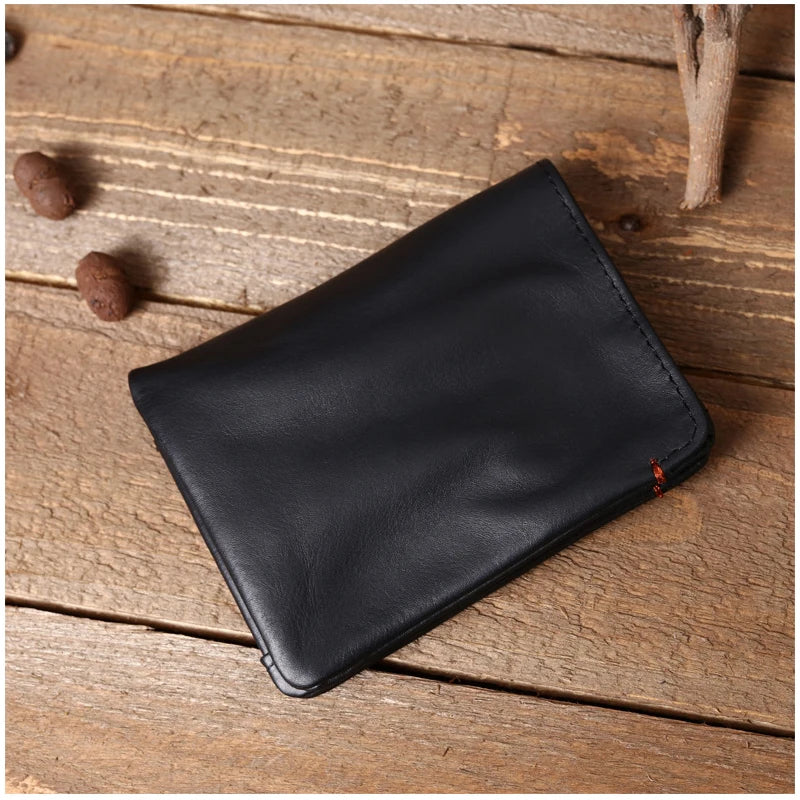 Portefeuille en cuir de vachette couche supérieure Portefeuille en cuir véritable souple Porte-cartes de crédit pour hommes Sac à main de luxe Noir Élégant Simple Portefeuilles pour hommes