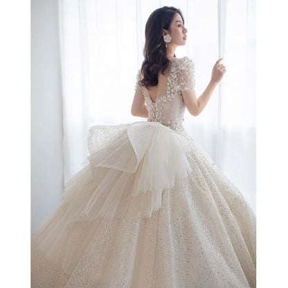 Luxury Short Sleeve Wedding Dress 2026 New Bridal Dress V Neck Beading Shinning Ball Gown Sweep Train Vestido  Noiva Customized
