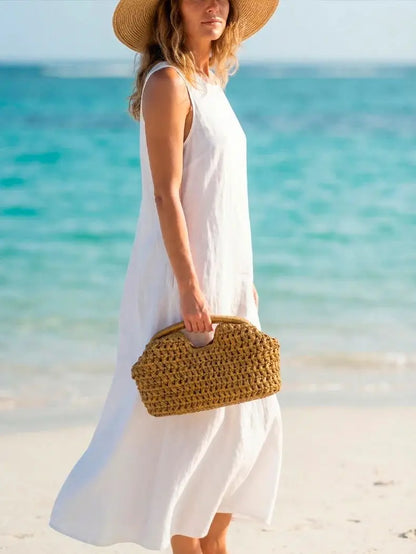 Seaside vacation style grass woven bag, spring and summer new style, European and American high-end feeling, hand-held gold clip
